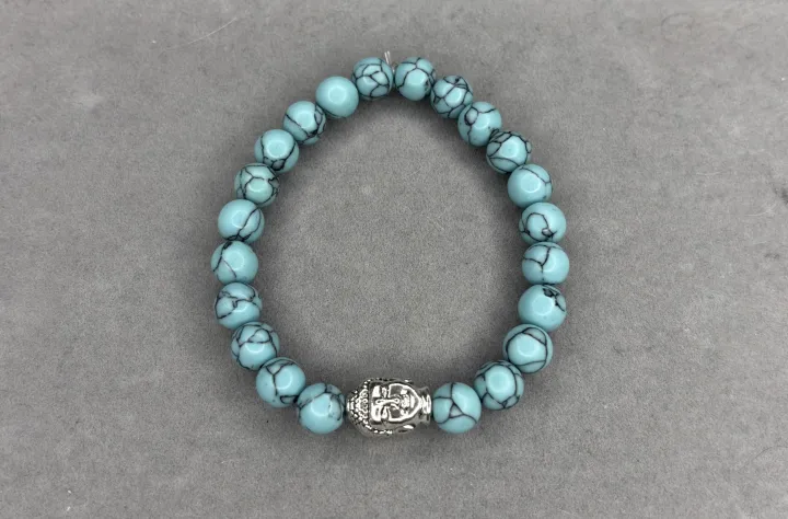 Pulsera turquesa con dije de Buda