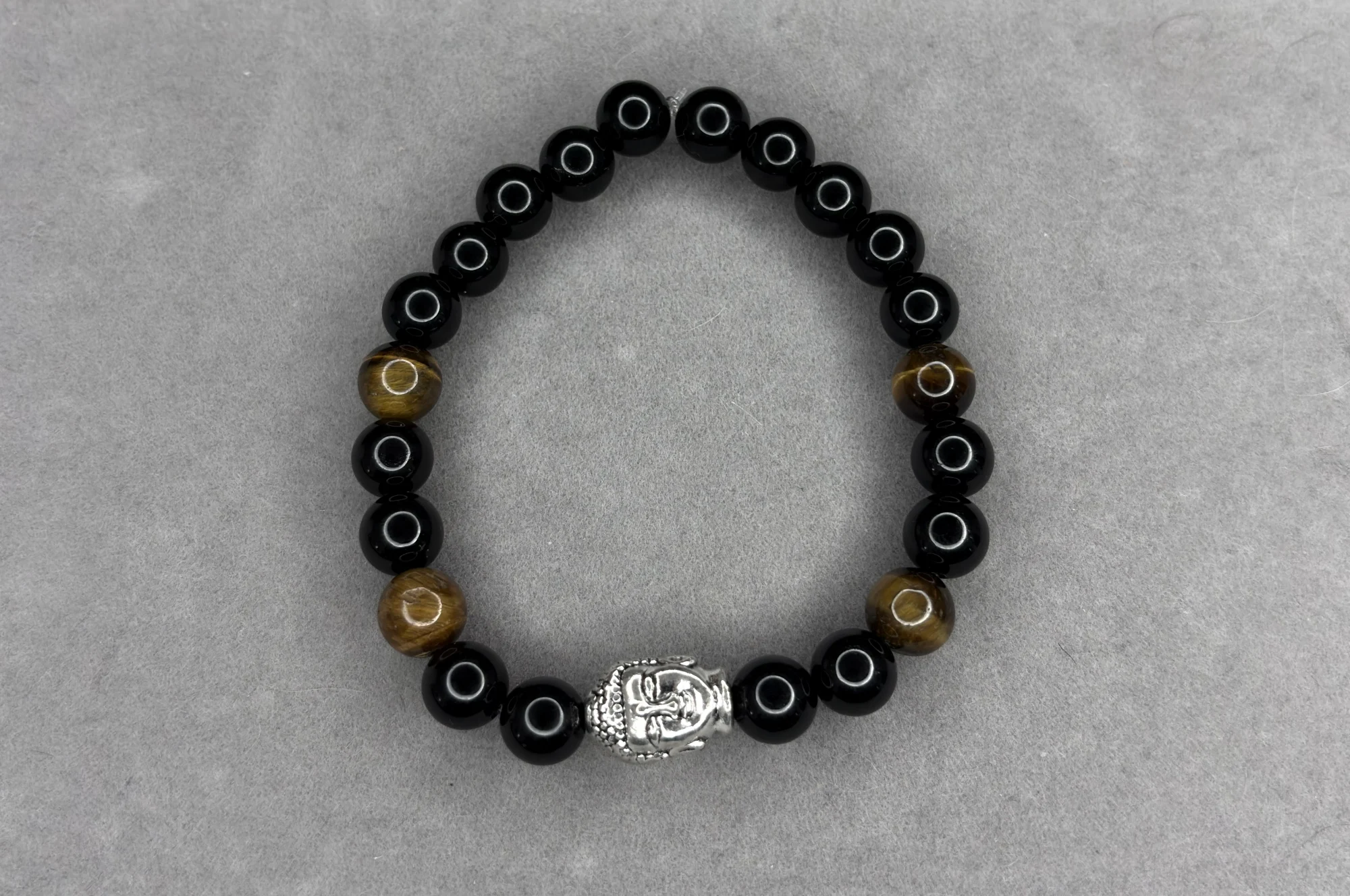 Pulsera ónix + ojo de tigre + dije Buda
