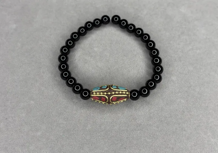 Pulsera Ónix + Dije Tibetano
