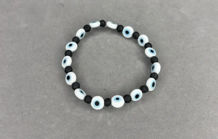 Pulsera Piedra Volcánica + Ojos Turcos Blancos