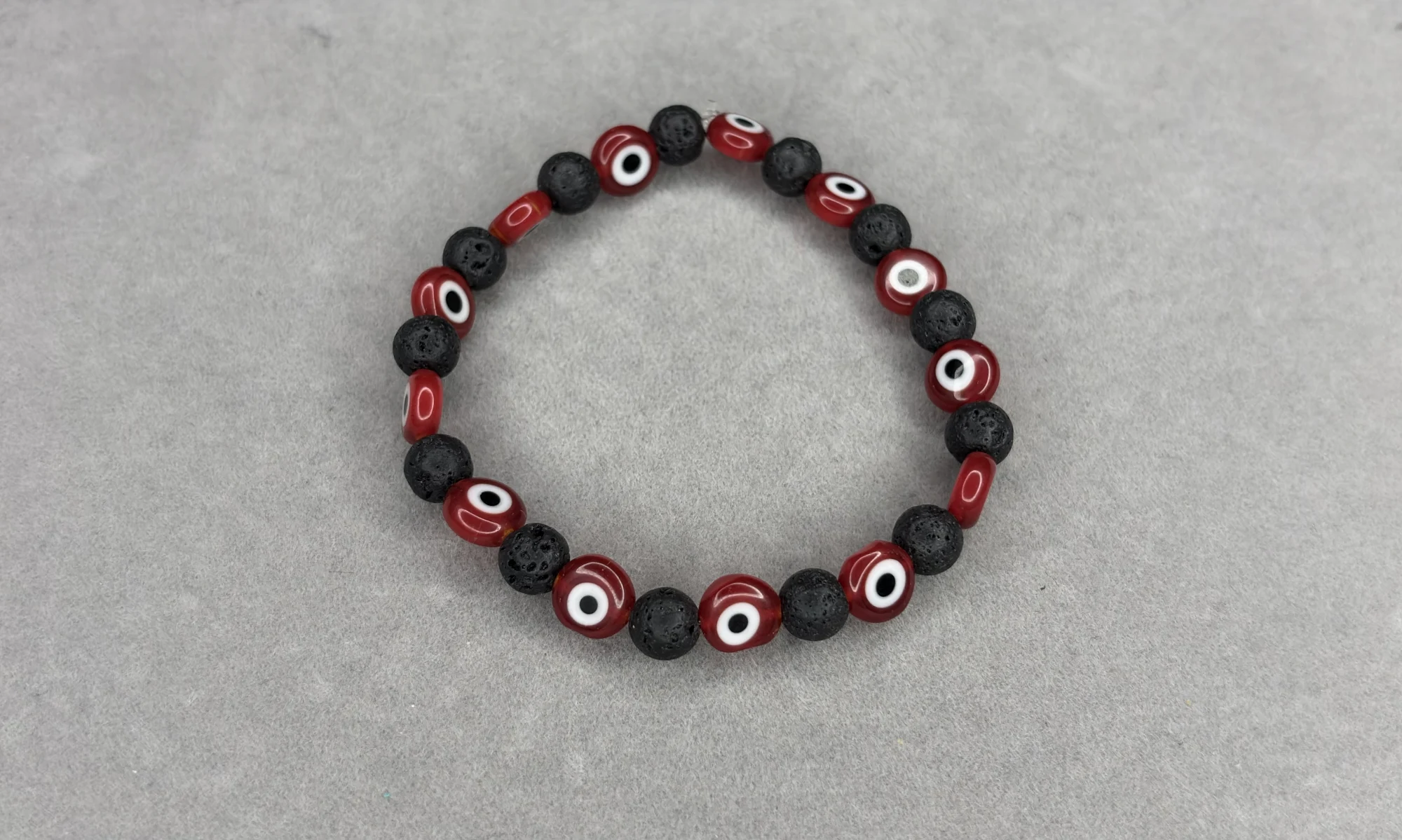Pulsera Piedra Volcánica + Ojos Turcos Rojos