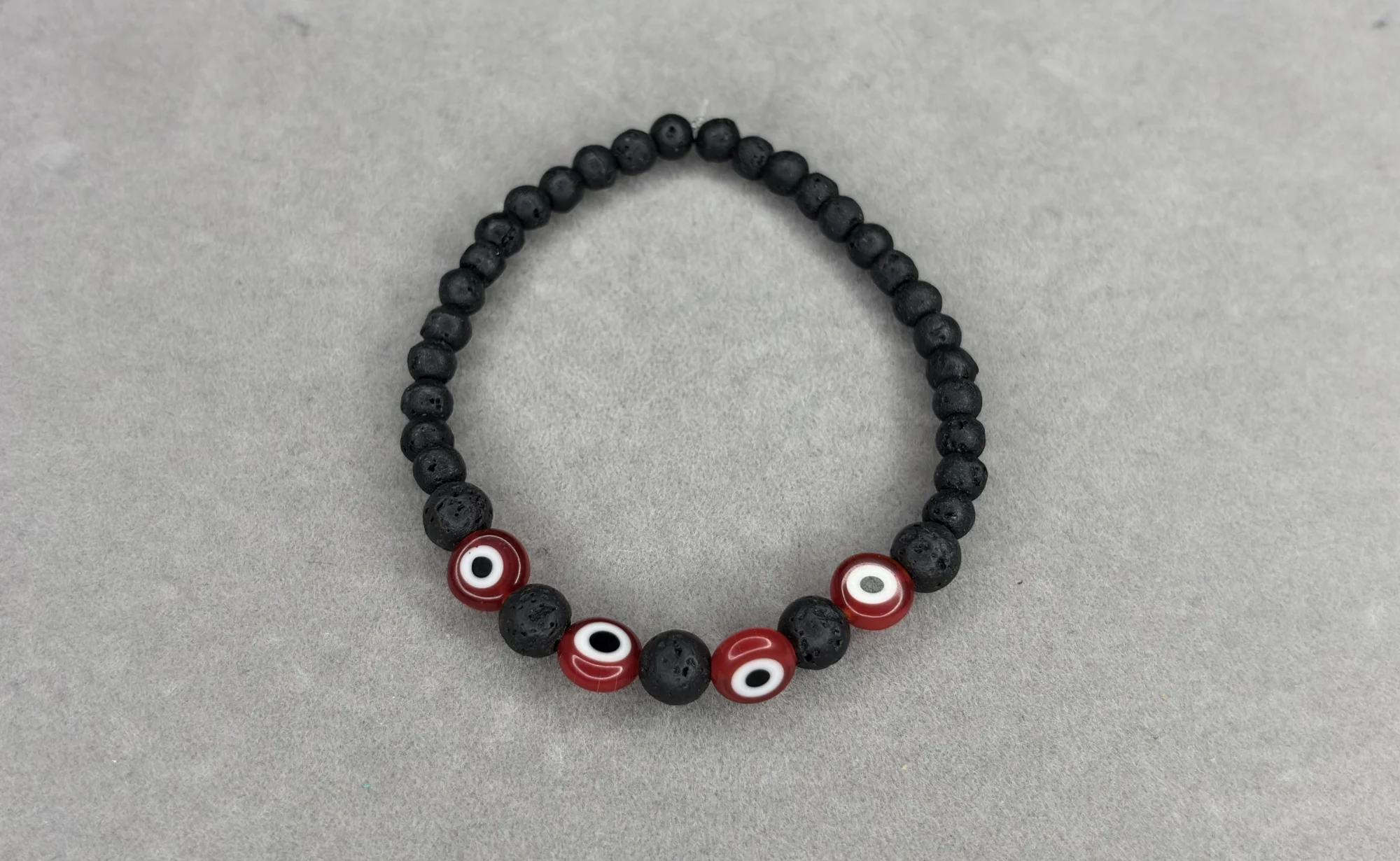 Pulsera Piedra Volcánica + Piedra Volcánica #6 + Ojos Turcos Rojos